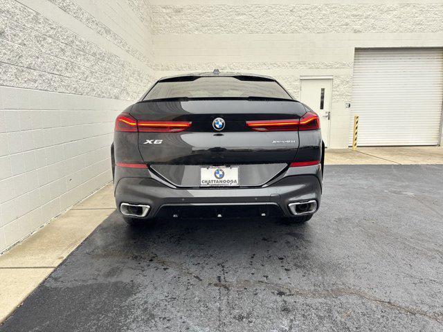 new 2025 BMW X6 car, priced at $77,875