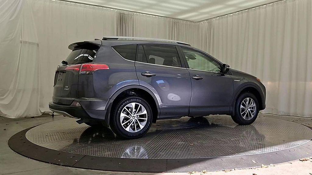 used 2018 Toyota RAV4 Hybrid car, priced at $23,492