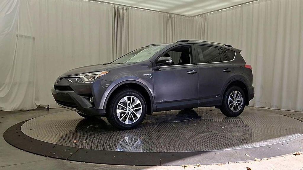 used 2018 Toyota RAV4 Hybrid car, priced at $23,492