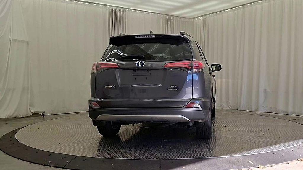 used 2018 Toyota RAV4 Hybrid car, priced at $23,492