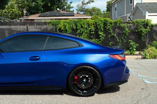 used 2024 BMW M4 car, priced at $89,999
