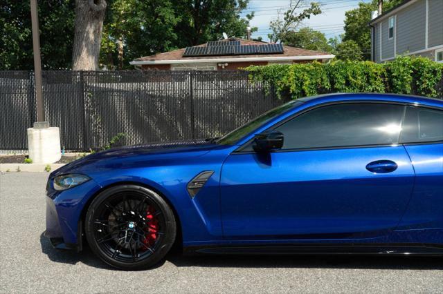 used 2024 BMW M4 car, priced at $89,999