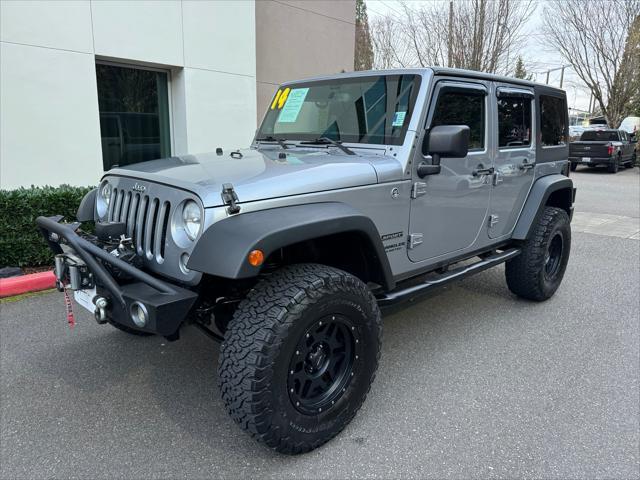 used 2014 Jeep Wrangler Unlimited car, priced at $16,880