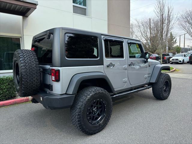 used 2014 Jeep Wrangler Unlimited car, priced at $16,880