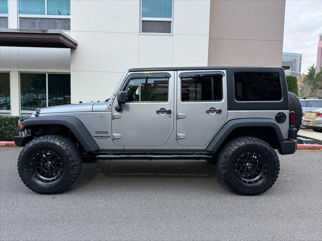 used 2014 Jeep Wrangler Unlimited car, priced at $16,880