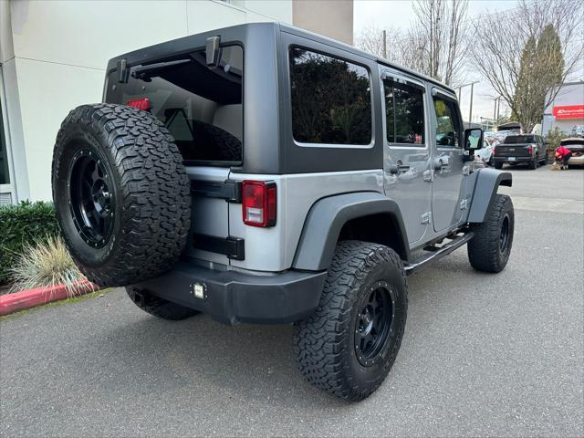 used 2014 Jeep Wrangler Unlimited car, priced at $16,880