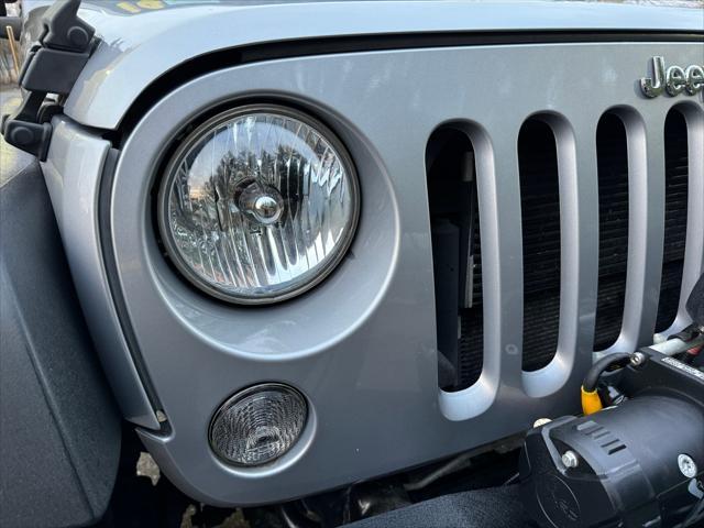 used 2014 Jeep Wrangler Unlimited car, priced at $16,880