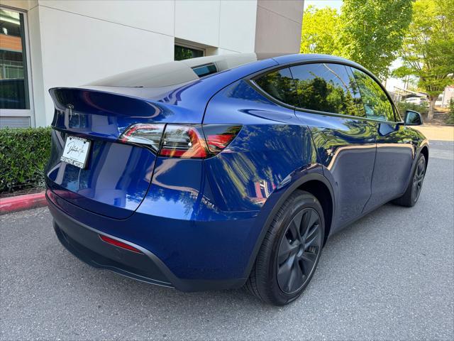 used 2024 Tesla Model Y car, priced at $35,780