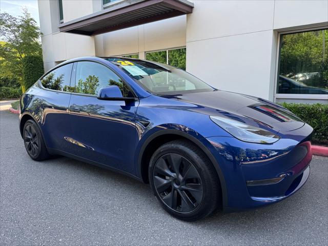 used 2024 Tesla Model Y car, priced at $35,780