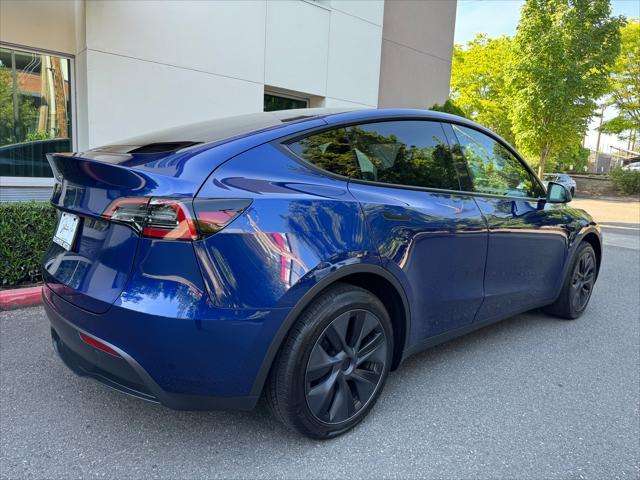 used 2024 Tesla Model Y car, priced at $35,780