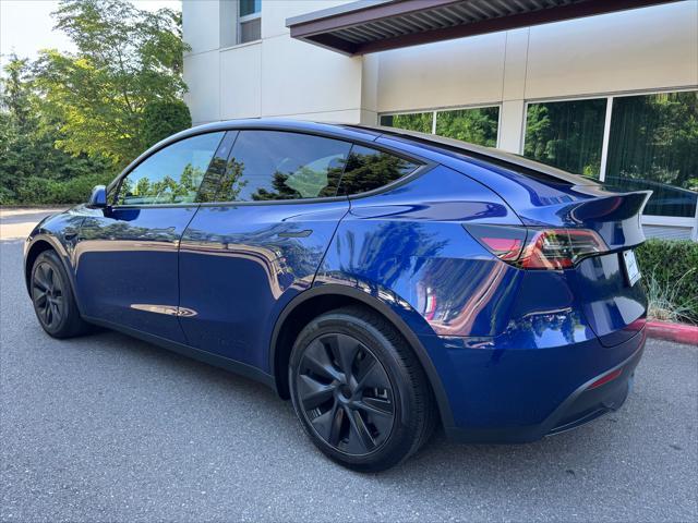 used 2024 Tesla Model Y car, priced at $35,780