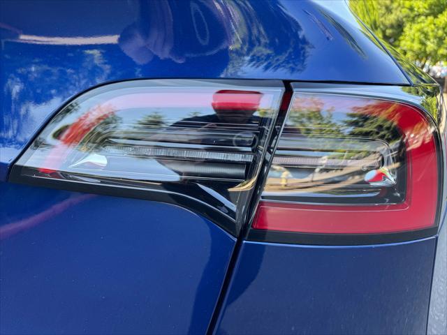used 2024 Tesla Model Y car, priced at $35,780