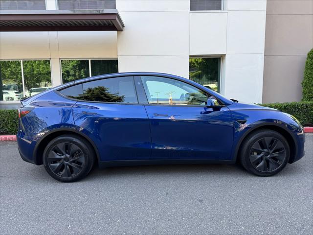 used 2024 Tesla Model Y car, priced at $35,780