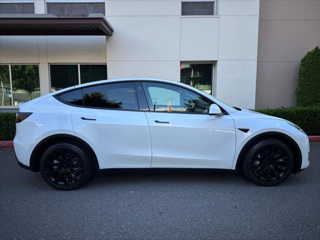 used 2023 Tesla Model Y car, priced at $31,880