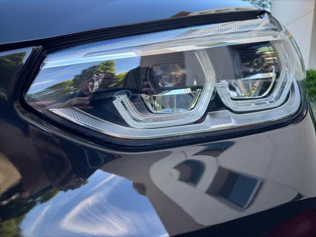 used 2021 BMW X3 M car, priced at $54,880
