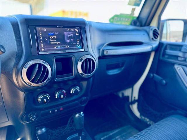 used 2012 Jeep Wrangler Unlimited car, priced at $15,995