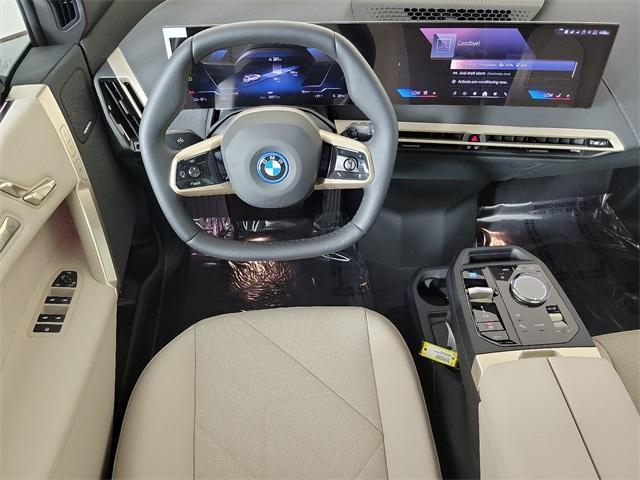 new 2025 BMW iX car, priced at $99,020