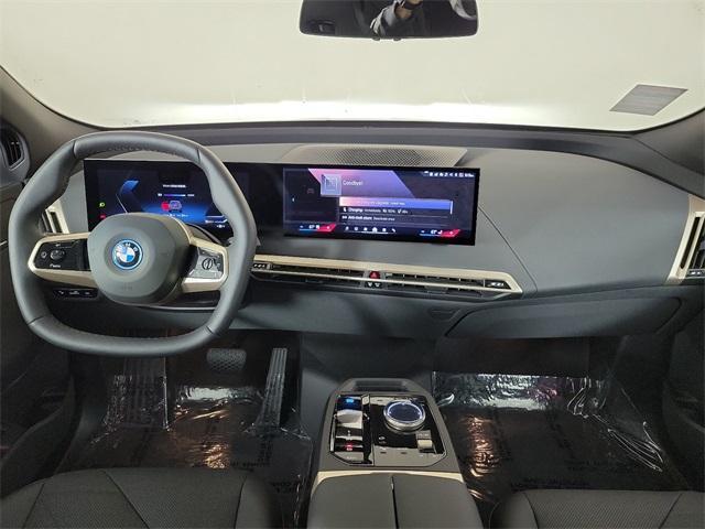 new 2025 BMW iX car, priced at $100,280