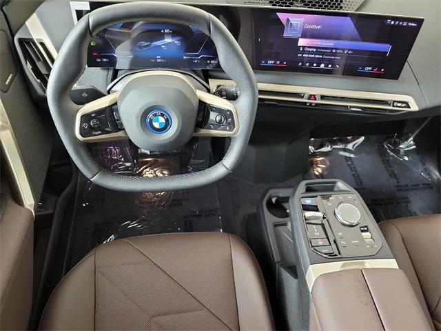 new 2024 BMW iX car, priced at $94,995