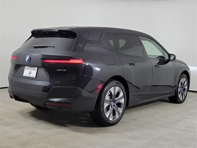 new 2024 BMW iX car, priced at $94,995