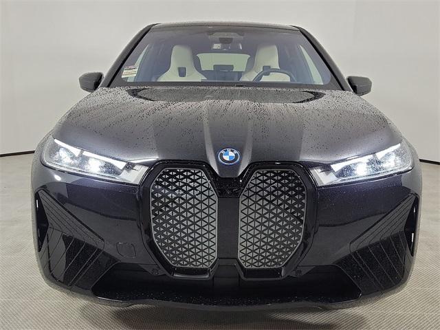 new 2024 BMW iX car, priced at $97,875