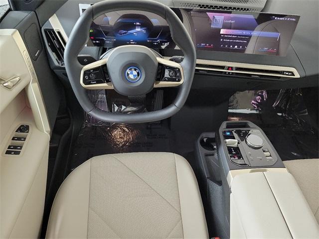 new 2024 BMW iX car, priced at $98,374