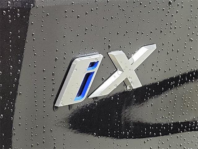 new 2024 BMW iX car, priced at $98,374