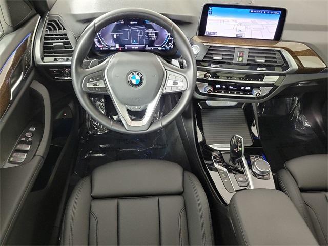 used 2021 BMW X3 PHEV car, priced at $37,740