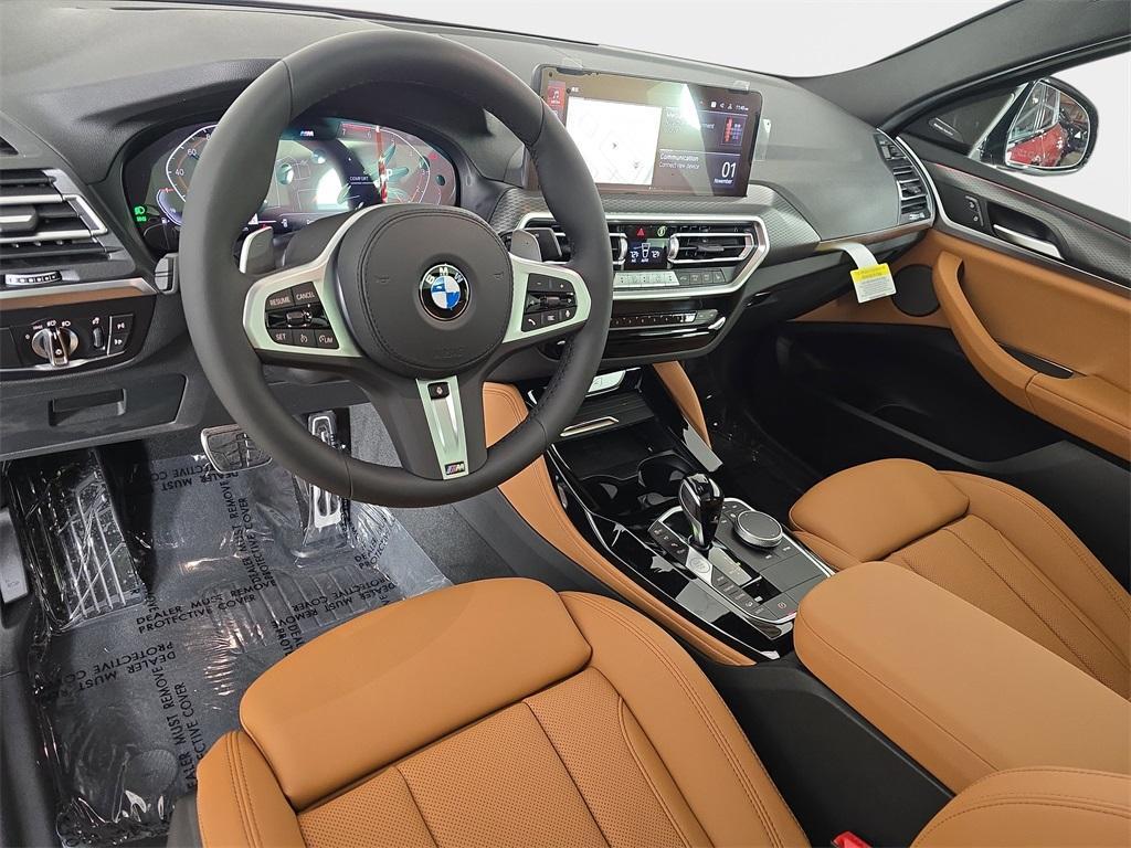 new 2025 BMW X4 car, priced at $63,590