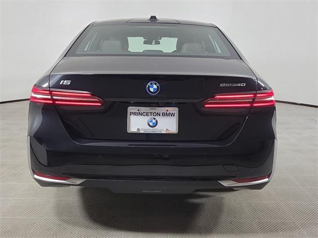 used 2024 BMW i5 car, priced at $55,990