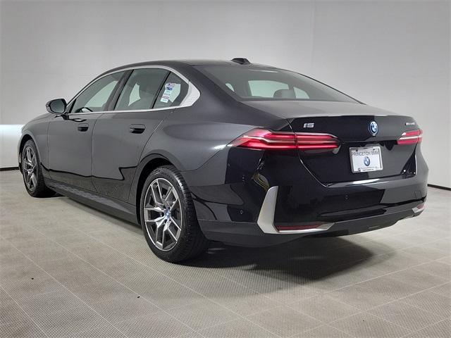 used 2024 BMW i5 car, priced at $55,990