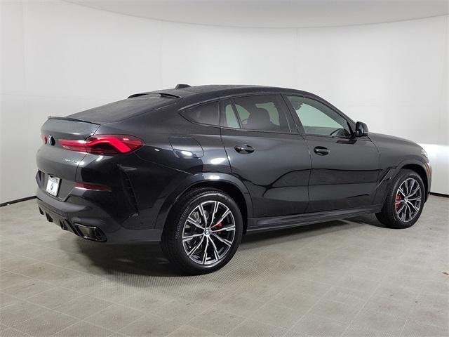 new 2025 BMW X6 car, priced at $81,575