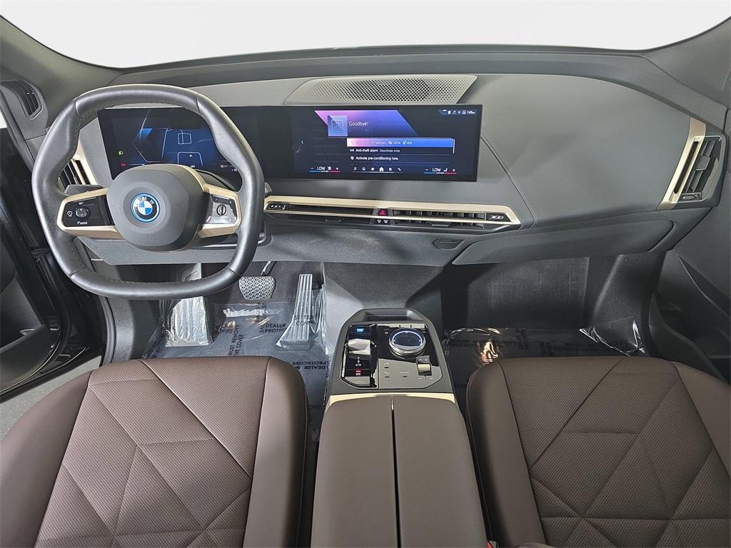 used 2025 BMW iX car, priced at $59,205