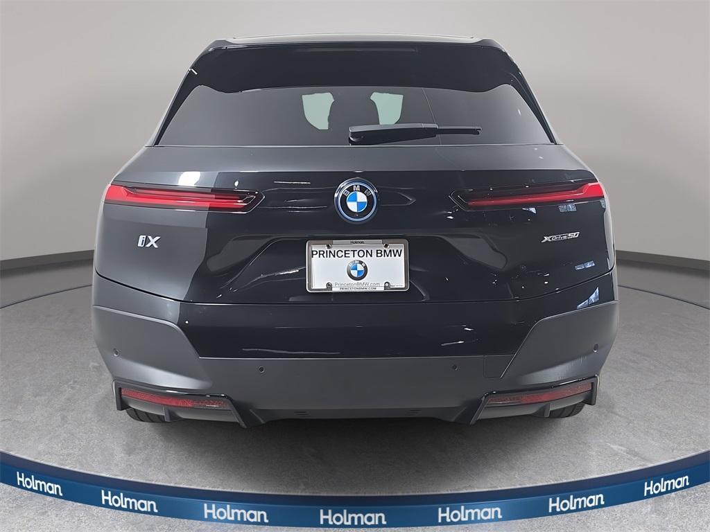 used 2025 BMW iX car, priced at $59,205