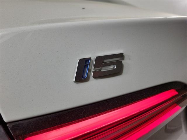used 2024 BMW i5 car, priced at $58,515