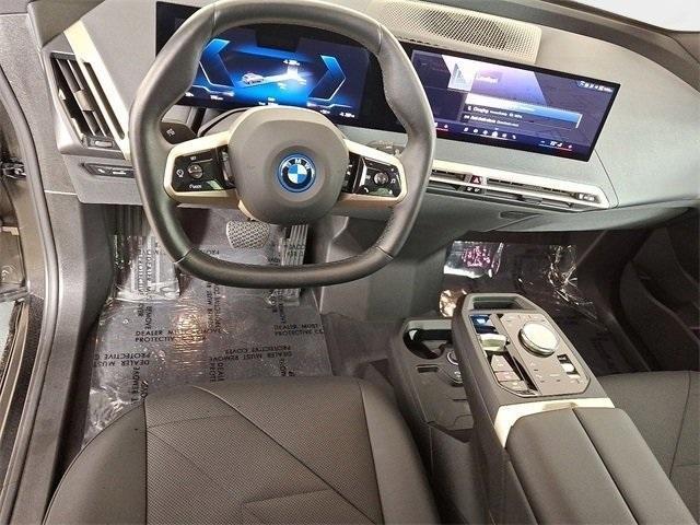 used 2025 BMW iX car, priced at $76,856