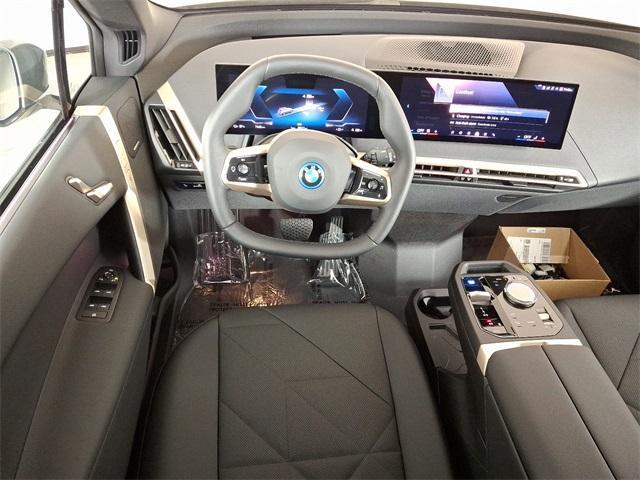 new 2025 BMW iX car, priced at $97,545