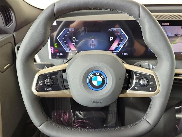 new 2025 BMW iX car, priced at $99,020