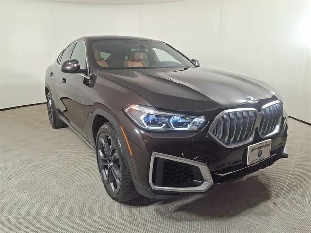 used 2023 BMW X6 car, priced at $63,570