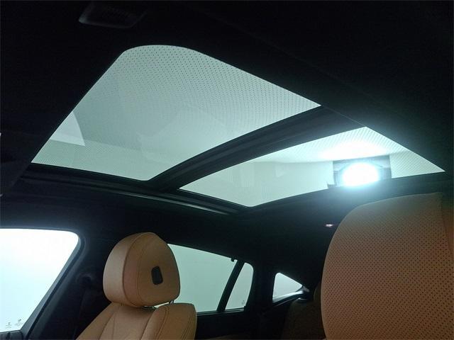 used 2023 BMW X6 car, priced at $63,570