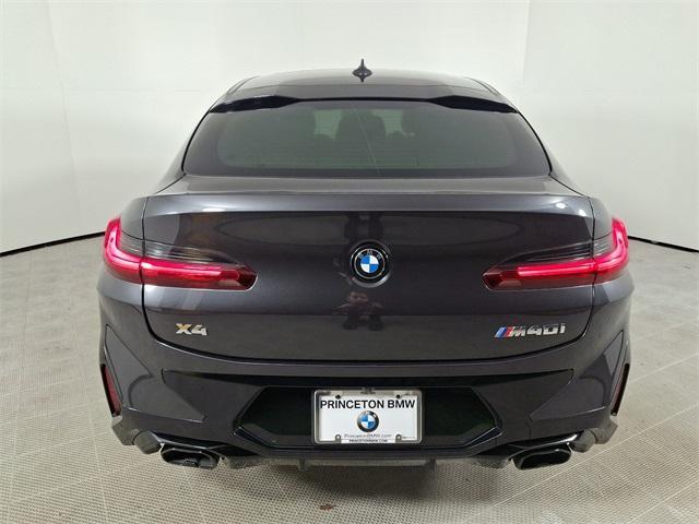 used 2023 BMW X4 car, priced at $54,995