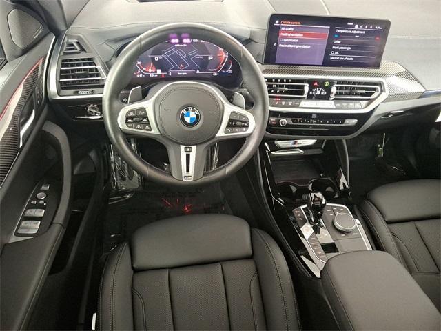 used 2023 BMW X4 car, priced at $54,995