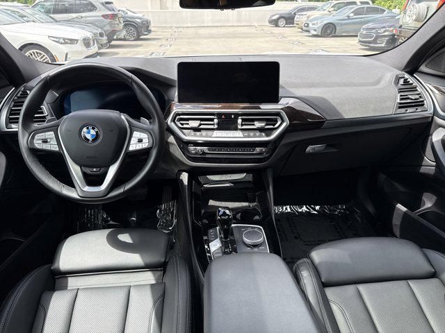 used 2024 BMW X4 car, priced at $46,097