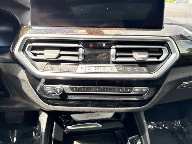 used 2024 BMW X4 car, priced at $46,097