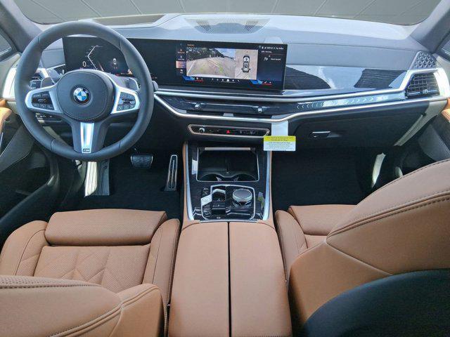 used 2026 BMW X5 car, priced at $72,709