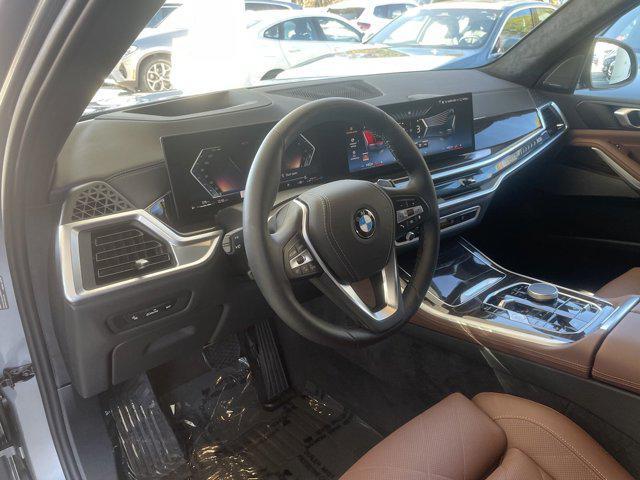 used 2025 BMW X5 car, priced at $68,994