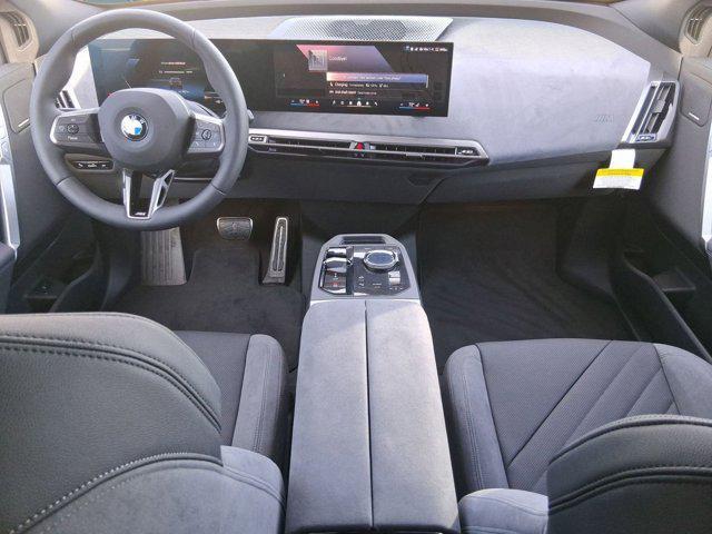 new 2026 BMW iX car, priced at $100,870