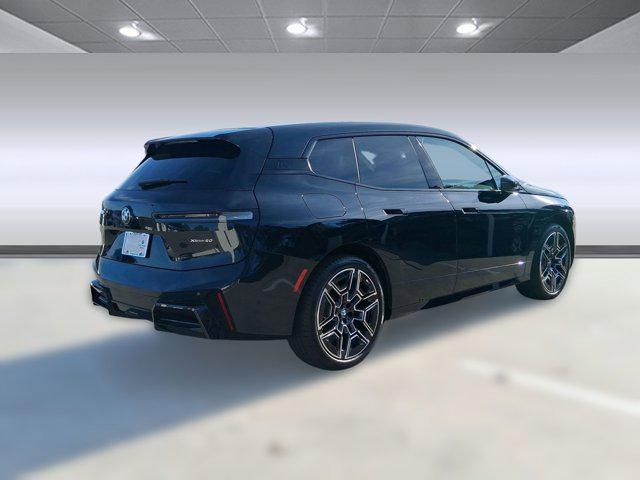 new 2026 BMW iX car, priced at $100,870