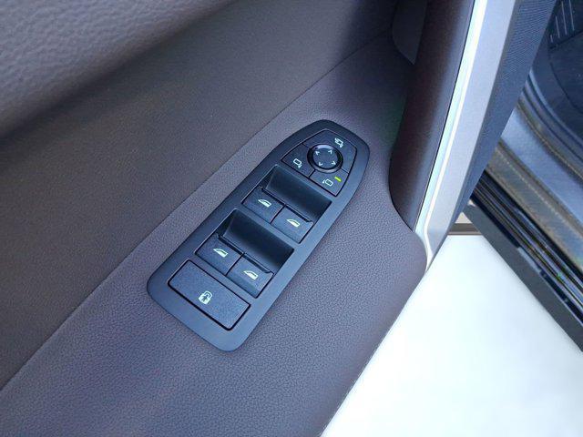 new 2026 BMW iX car, priced at $81,575