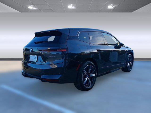 new 2026 BMW iX car, priced at $81,575